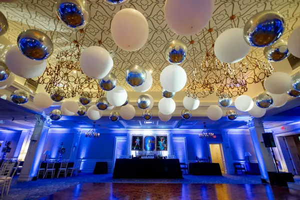 White and Silver Ceiling Balloon Install