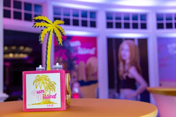 Sienna's Bat Mitzvah Sun Kissed palm tree cube centerpiece