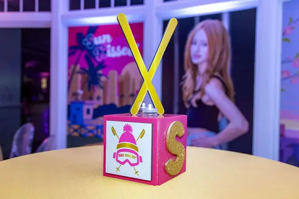 Sienna's Bat Mitzvah Ski Vacay cube centerpiece with gold skis