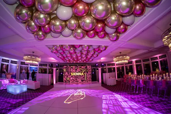 Sienna's Bat Mitzvah balloon ceiling, logo stage and lounge