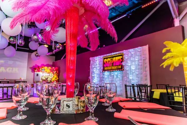 Pink feather palm tree centerpiece at Sophie's Bat Mitzvah