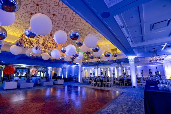 Greg's Bar Mitzvah ballroom with white and silver balloon ceiling