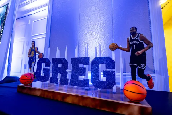 Blue glitter GREG letters with basketball player cutouts