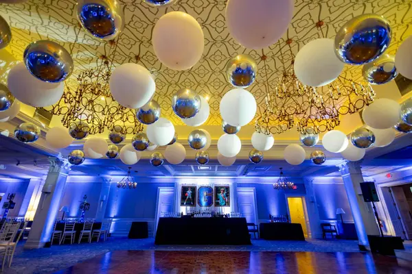 White and mirrored balloon ceiling over the ballroom dance floor