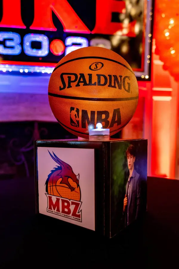 Basketball on an MBZ logo cube centerpiece at Mike's Bar Mitzvah