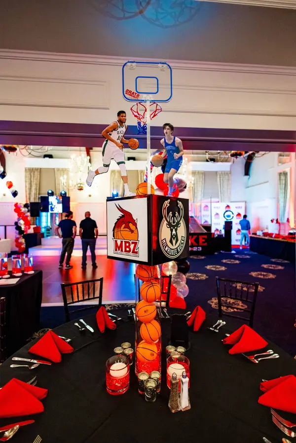 Basketball hoop and MBZ logo cube centerpiece at Mike's Bar Mitzvah