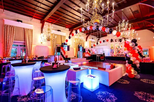 Mike's Bar Mitzvah ballroom with balloon columns, lounge and LED tables