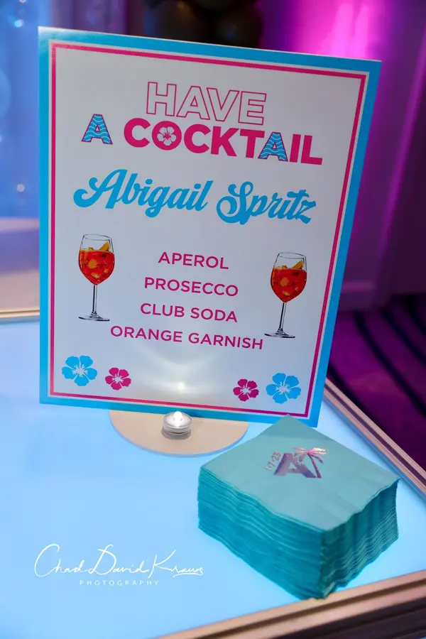 Abigail Spritz signature drink sign and logo napkins at Abby's Bat Mitzvah