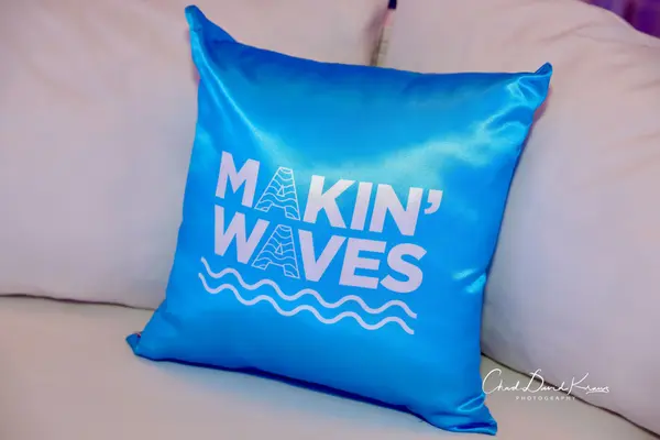 Blue Makin' Waves logo pillow at Abby's Bat Mitzvah