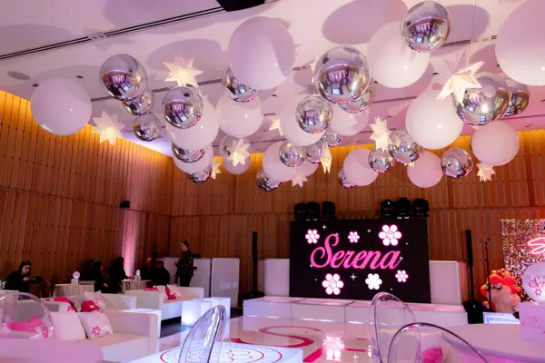 Serena's Bat Mitzvah ballroom with balloon ceiling, LED logo screen and lounge