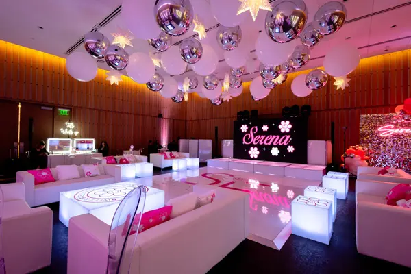 Lounge seating, glowing logo tables and LED screen at Serena's Bat Mitzvah