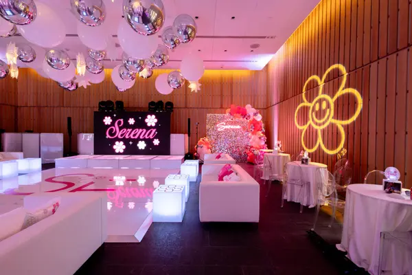 Neon daisy wall sign, lounge and LED screen at Serena's Bat Mitzvah