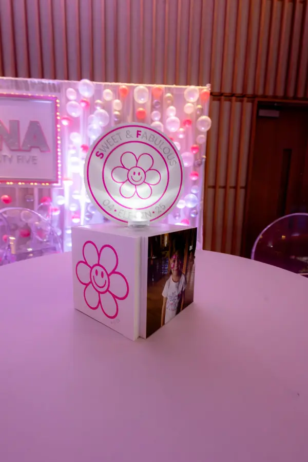 Sweet and Fabulous photo cube centerpiece at Serena's Bat Mitzvah