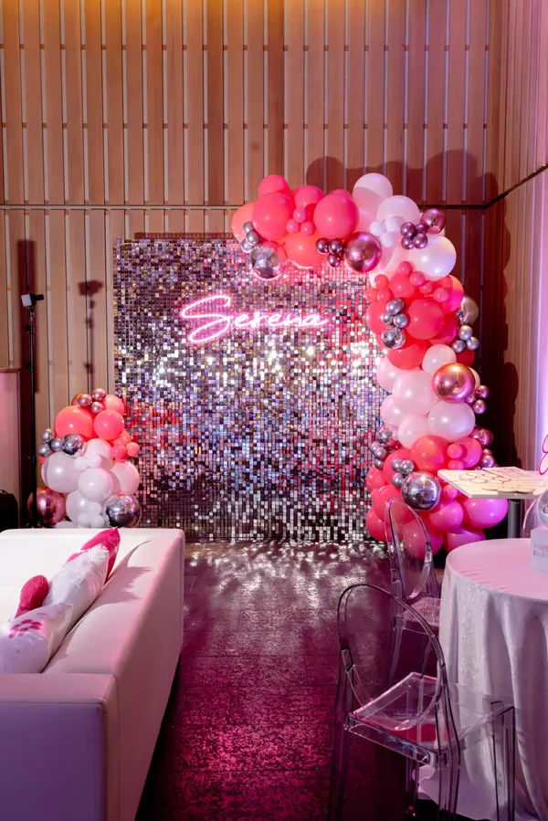 Serena's Bat Mitzvah sequin backdrop, balloon arch and lounge seating