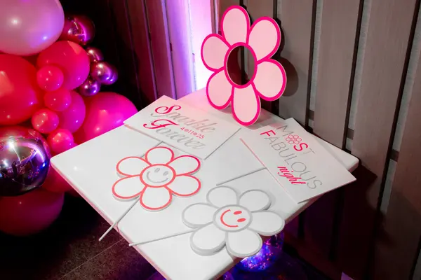 Daisy photo props and Sparkle Forever signs at Serena's Bat Mitzvah