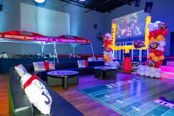 Jeremy's Bar Mitzvah lounge, food tents and Chiefs balloon goal post