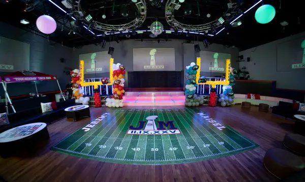 Full room view of Jeremy's Bar Mitzvah football field dance floor