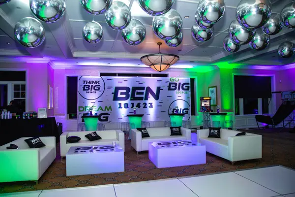 Wide view of Ben's Bar Mitzvah lounge under a chrome balloon ceiling