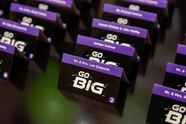 Go Big tent escort cards with table numbers at Ben's Bar Mitzvah