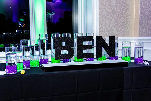 Ben's Bar Mitzvah candle lighting display with black glitter letters