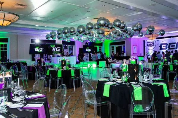 Ballroom view of Ben's Bar Mitzvah with balloon ceiling and uplit walls