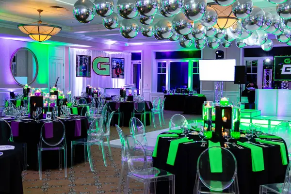 Guest tables and glitter centerpieces at Ben's Bar Mitzvah