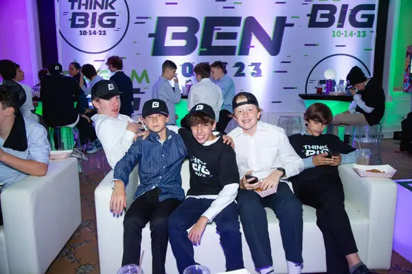 Guests on the lounge sofa at Ben's Bar Mitzvah with Big pillows