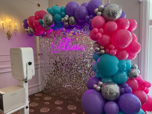 Organic Balloon Garland Over Shimmer Wall