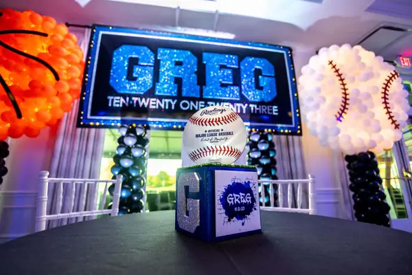 Balloon basketball and baseball signage
