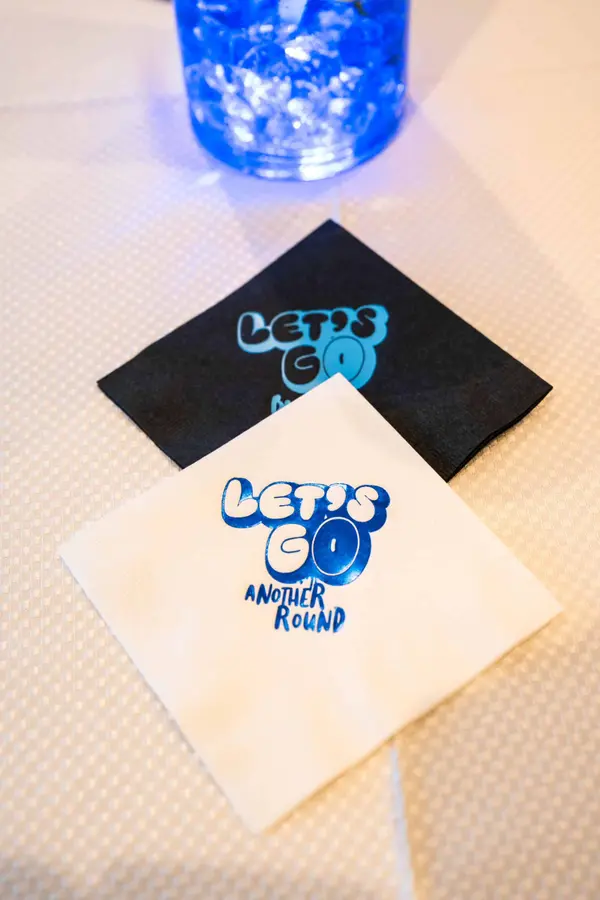 Owen's Bar Mitzvah custom logo cocktail napkins in blue foil