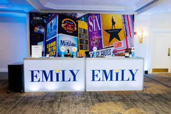 Emily's Bat Mitzvah branded LED bar with Broadway marquee mural backdrop