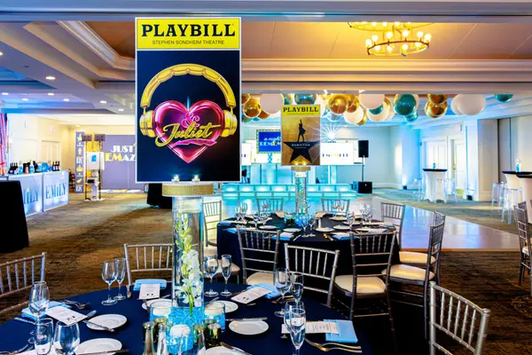 Emily's Bat Mitzvah And Juliet Playbill centerpiece in the ballroom