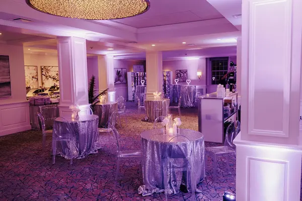 Ella's Bat Mitzvah cocktail hour with sequin high-tops and ghost stools
