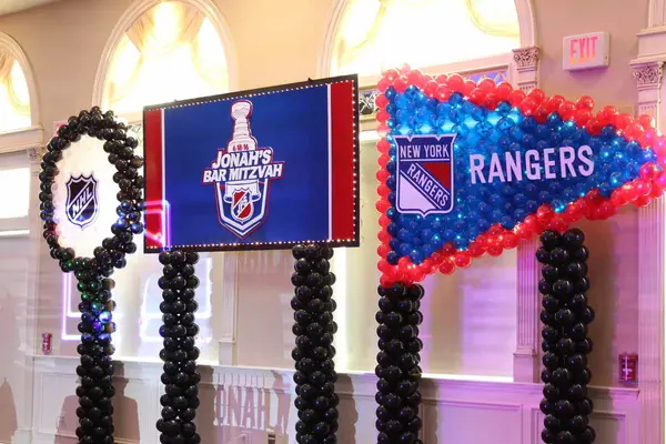 Hockey Puck and Pennant Balloon Sculpture