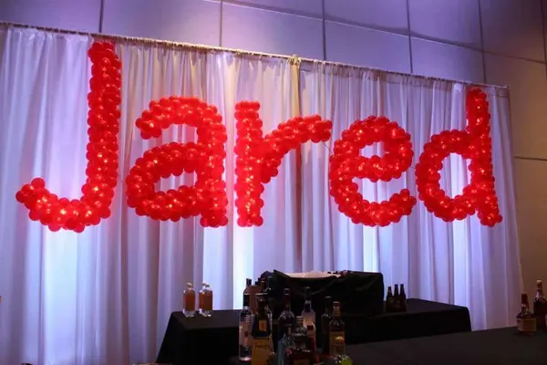 Red Name in Balloons Sculpture