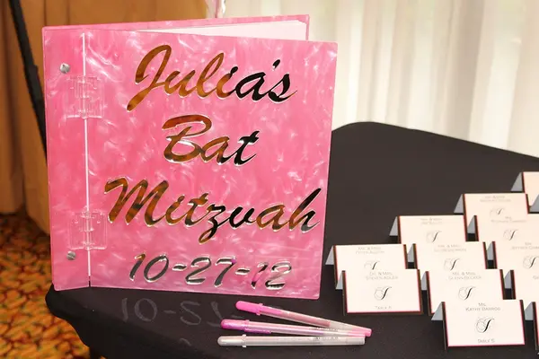 Pink Lucite Sign in Book