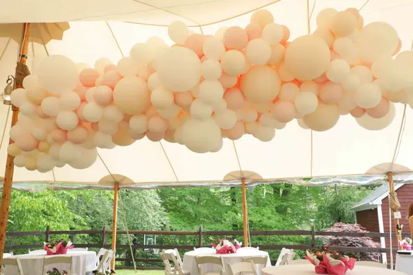 Organic Balloon Garland on Tent Ceiling