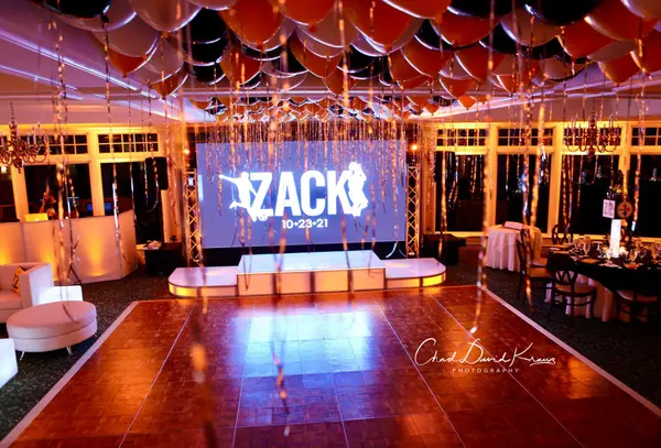 Loose Balloons Over Dance Floor Ceiling