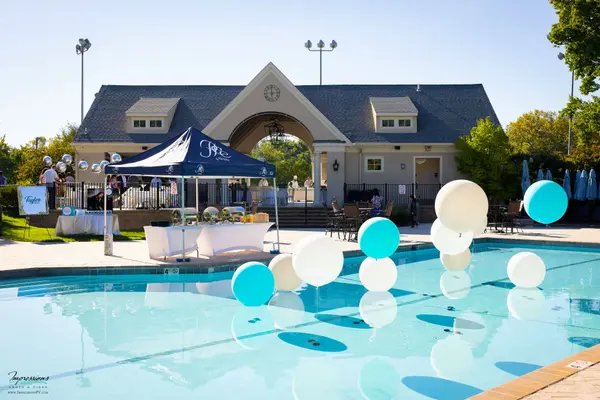 Jumbo Balloons Over Pool