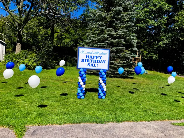 Custom Sign & Balloon Scape